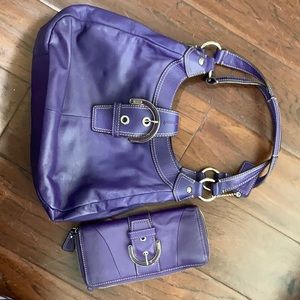 Purple coach purse and wallet